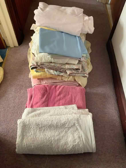 Photo of free Huge pile of clean bedding and towels (Ducklington OX29) #1