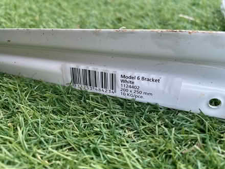 Photo of free White metal brackets (Dore, S17) #2