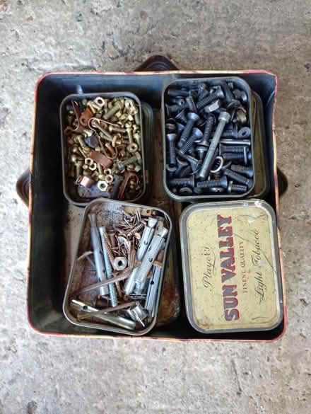 Photo of free 11 tobacco tins of old screws (Elmstead Market CO77AJ) #1