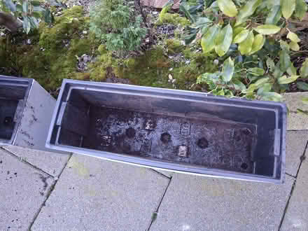 Photo of free Two large grey plastic planter boxes (BT8) #2