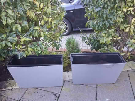 Photo of free Two large grey plastic planter boxes (BT8) #1