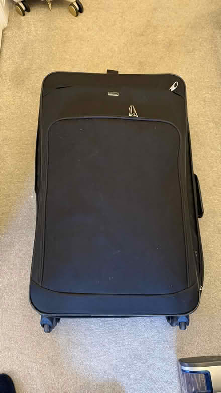 Photo of free Big Black suitcase with duvet (Townsend AL3) #1