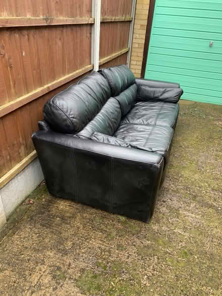 Photo of free Black 4 seater leather sofa (Stifford Clays RM16) #1