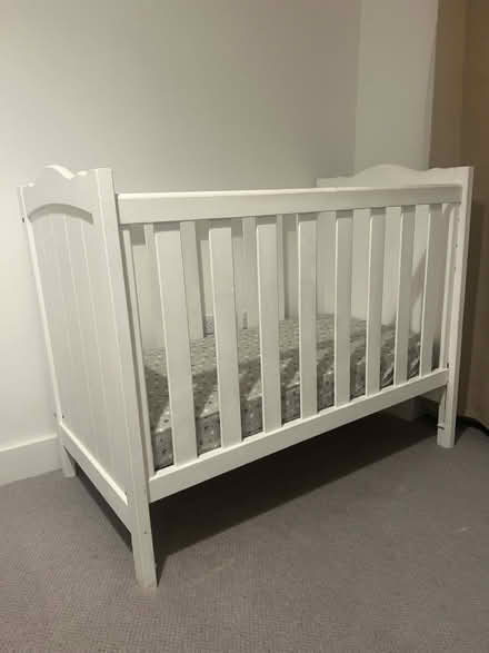 Photo of free Well used baby cot bed (N3) #1