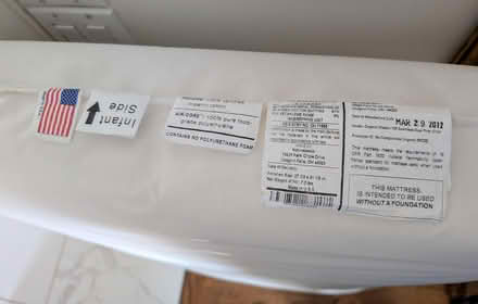 Photo of free Infant/Toddler Naturepedic Mattress (Bloor/Runnymede area) #4