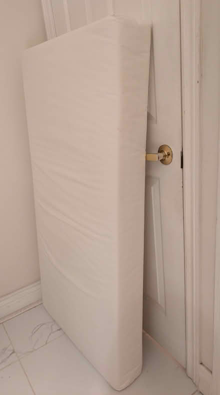 Photo of free Infant/Toddler Naturepedic Mattress (Bloor/Runnymede area) #1