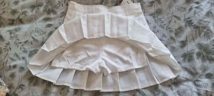 Photo of free White Pleated Girls Skirt Size Small (waist 66cm) (Thamesmead SE28) #2