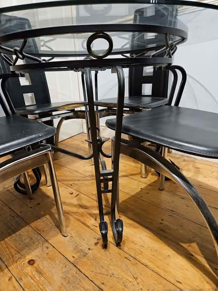 Photo of free Circular glass topped dining table (Buckley Hill L30) #1