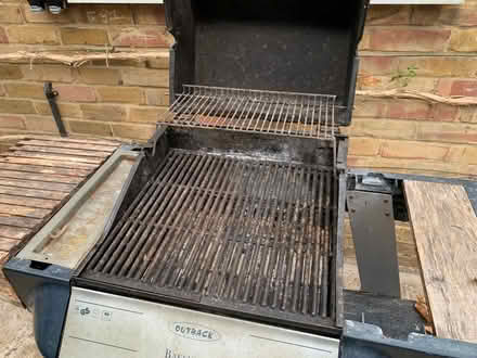 Photo of free BBQ - Charcoal with cover (Wood Street Village GU3) #3