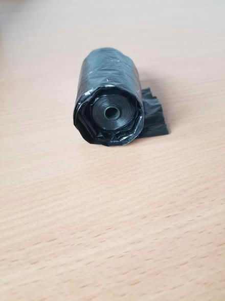 Photo of free Roll of small black bags (Gloucester) #1