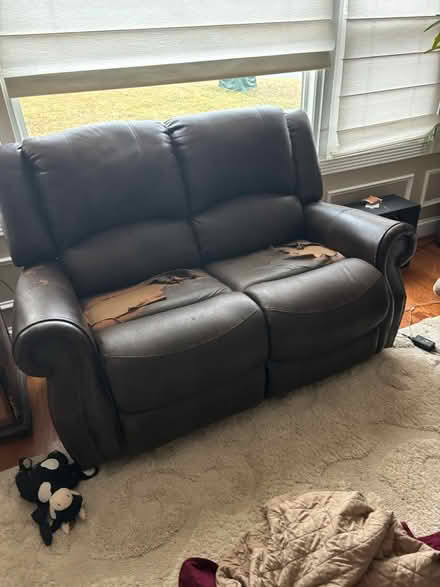 Photo of free Use leather recliner loveseat (Fall church) #2