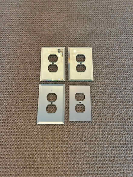 Photo of free 4 Mirrored Electrical Outlet Plates (UES, 69 St bet 2nd and 1st Ave) #1