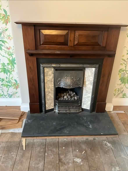 Photo of free Wooden/cast Iron Fire Surround (Minehead) #2