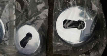Photo of free Polished chrome keyhole covers (SE15) #2