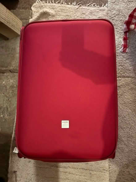Photo of free Red medium size suitcase (Beverstone GL8) #1