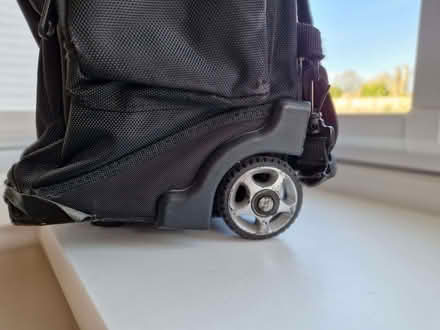 Photo of free Black rucksack with wheels (Dunston LN4) #2
