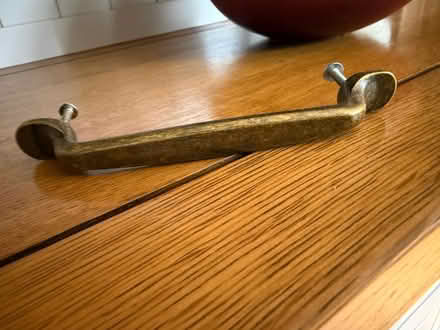 Photo of free 27 kitchen handles, bronze effect (Urmston) #1