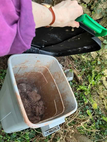 Photo of free Dustbin half full of dried terracotta clay. (Downend GL6) #1