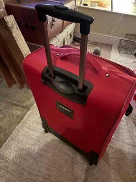 Photo of free Red medium size suitcase (Beverstone GL8) #2
