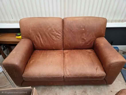 Photo of free Brown Leather sofa and pouffe (Newcastle-under-Lyme ST7) #1