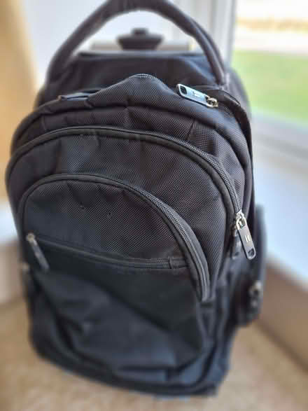 Photo of free Black rucksack with wheels (Dunston LN4) #1
