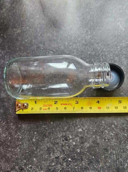 Photo of free Six small glass bottles with lids (AB15) #2