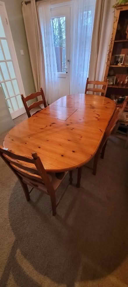 Photo of free Extending pine table and 4 chairs (Newport Pagnell MK16) #2