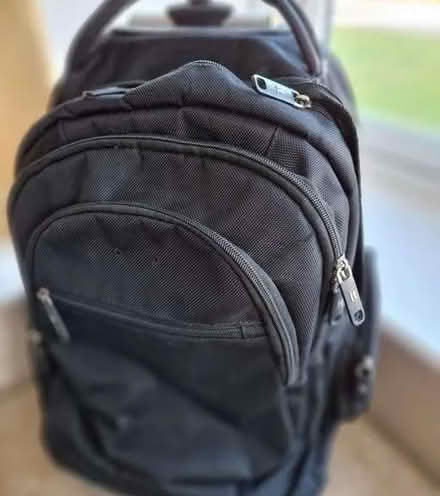 Photo of free Black rucksack with wheels (Dunston LN4) #1
