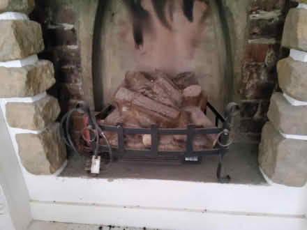 Photo of free Electric log effect fire/heater (Bexhill on Sea) #1