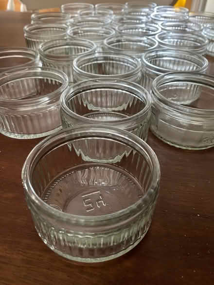 Photo of free 26 Matching glass Gü containers - Ideal as small candle hol (Eastbourne BN21) #1