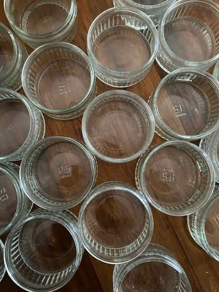 Photo of free 26 Matching glass Gü containers - Ideal as small candle hol (Eastbourne BN21) #2