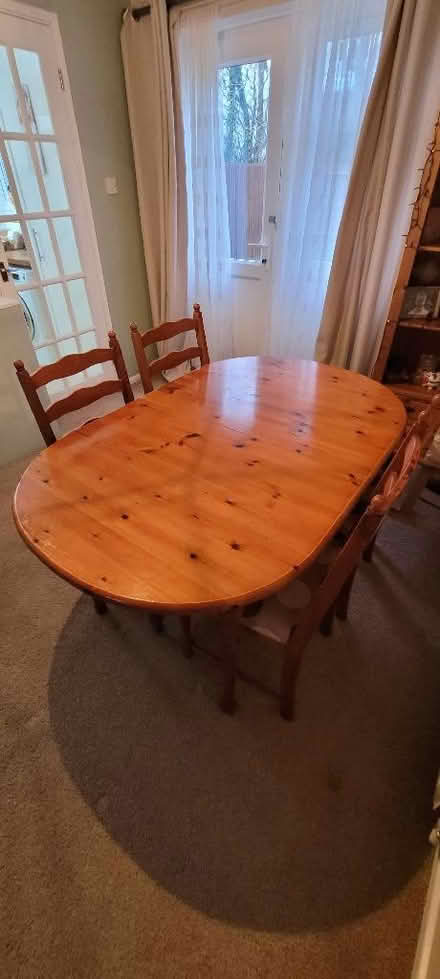 Photo of free Extending pine table and 4 chairs (Newport Pagnell MK16) #1