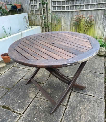 Photo of free Patio table -wooden (N11 Bounds Green) #1