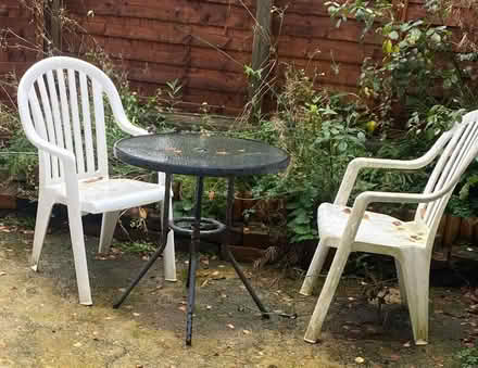 Photo of free Glass garden table and two white plastic chairs (Greaves LA1) #1
