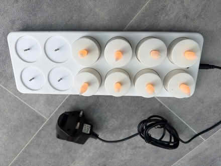 Photo of free 8 LED flicker candles with flutes & recharging base (Welling DA16) #1