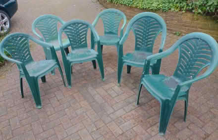 Photo of free 6 green plastic stacking garden chairs (Timperley WA15) #1
