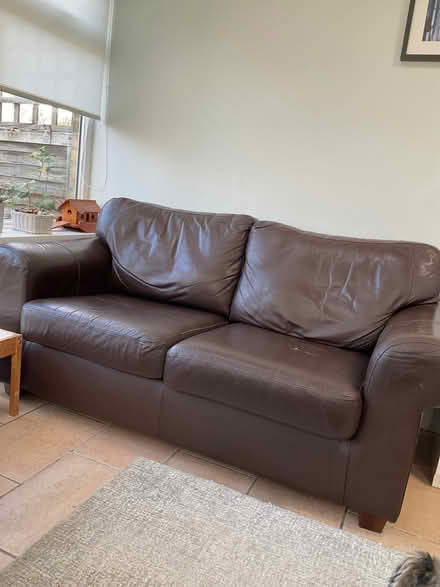 Photo of free Brown leather two seater settee (Hoddesdon EN11) #1