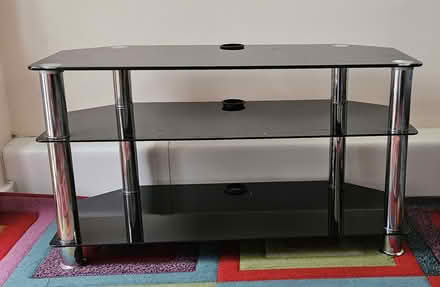 Photo of free Black Glass TV shelve (Eccles, M30) #1