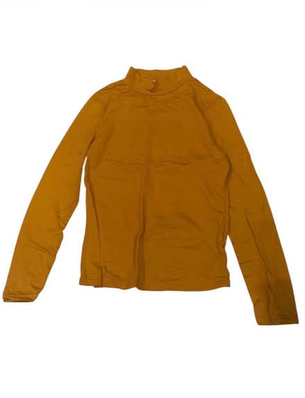 Photo of free Buzz Woman’s Mustard Top (Brooklyn Storage) #1