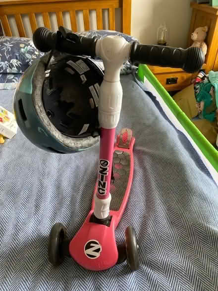Photo of free Folding scooter with a helmit (Woodlands TW7) #1
