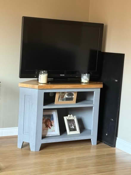 Photo of free Grey and wood TV unit (Ashingdon SS4) #1