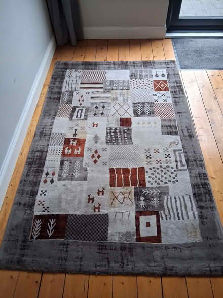 Photo of free Indoor large brownish patterned rug (BT8) #1