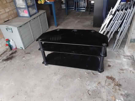 Photo of free Black glass tv stand (Brandon DH7) #1