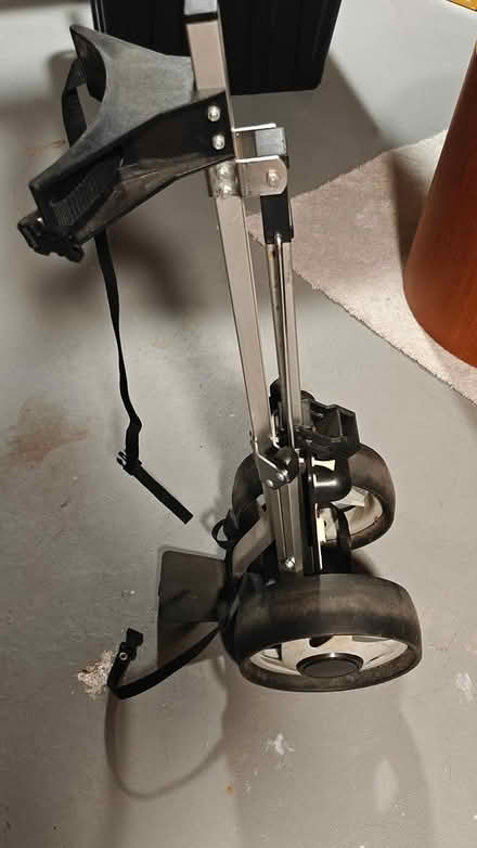 Photo of free folding golf bag cart (2808 Tradewind Dr., Miss.) #2