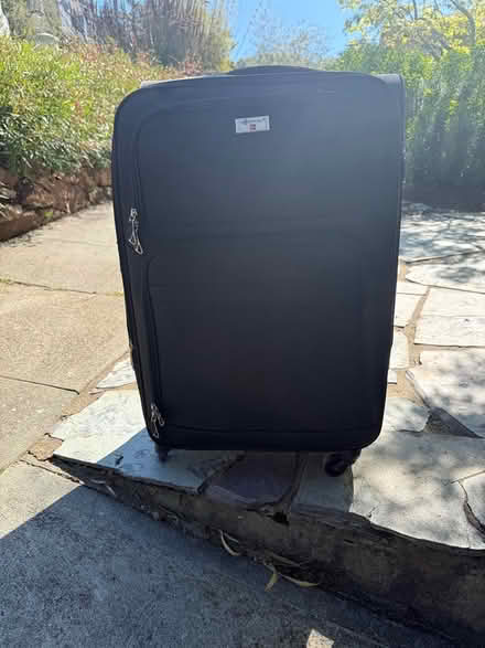 Photo of free Large black suitcase (Berkeley Hills near Kensington) #1