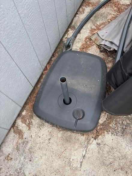 Photo of free Umbrella with base (Simsbury ct) #1