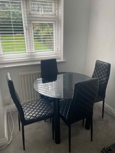Photo of free Round black glass table and 4 chairs (Coney Hall BR2) #1