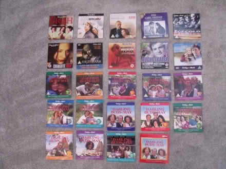 Photo of free 84 "newspaper" DVDs (west felton, SY11) #1