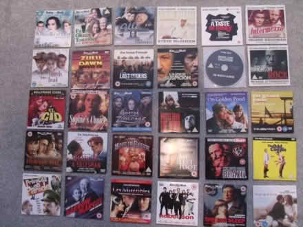 Photo of free 84 "newspaper" DVDs (west felton, SY11) #2