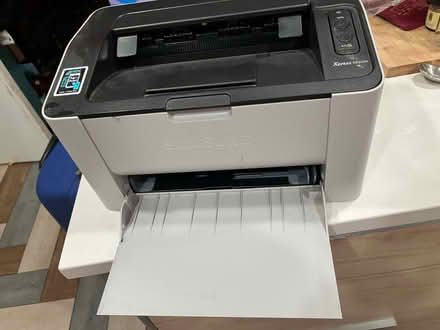 Photo of free Laser printer, needs small repair (Rogers Park by Sheridan/Howard) #1